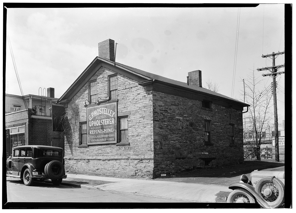 John Honam House, Lakewood, with a utility pole at the street